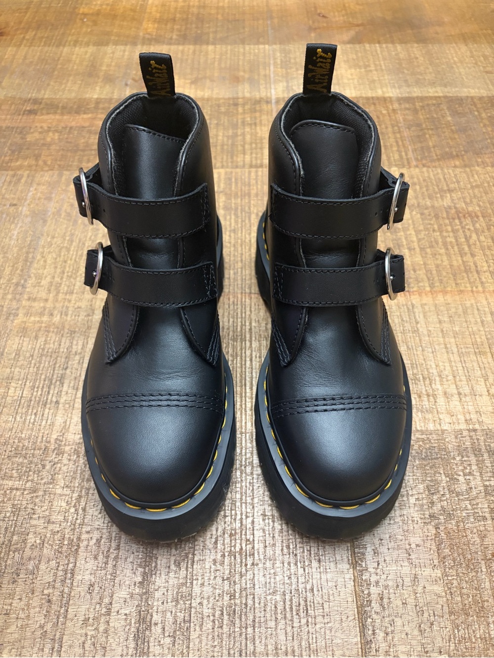 Dr. Martens “Devon” Black Double-Buckle Ankle Boots with Yellow Stitching